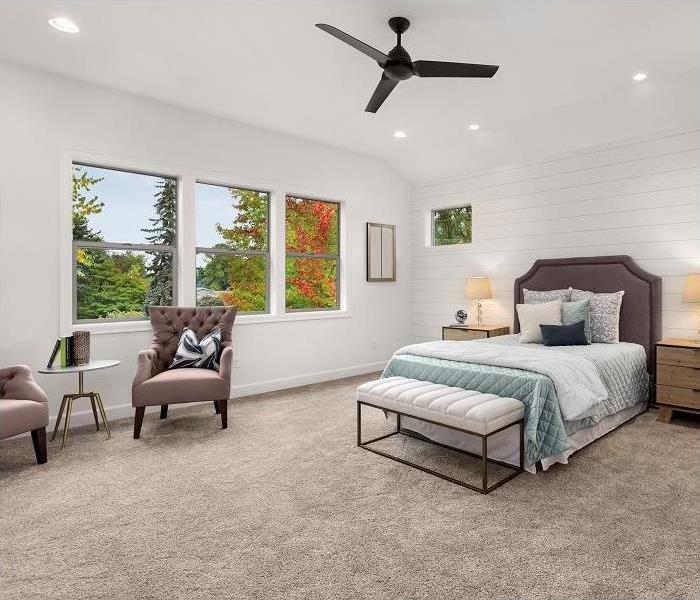 bedroom; furniture on wall-to-wall carpeting